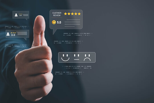 Business professional giving a thumbs up with digital customer review interface, five star rating and satisfaction feedback, illustrating customer experience, online reputation, service quality.