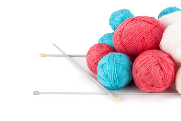Balls of yarn with knitting needles, isolated on white background . © kuzina1964