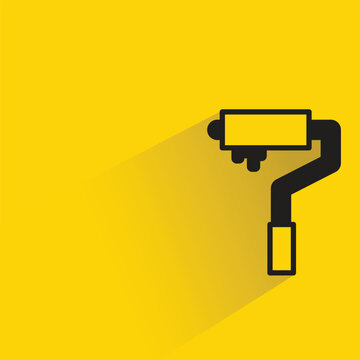 paint roller icon with shadow on yellow background