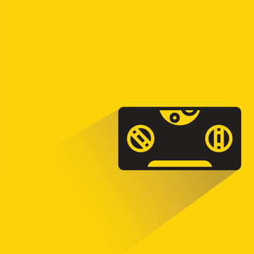 bubble level tool icon with shadow on yellow background