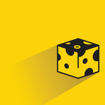 piece of cheese icon with shadow on yellow background