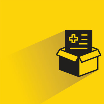 medical file in box with shadow yellow background