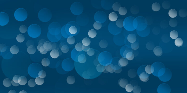 Abstract blue bokeh background, with soft glowing, circles of light, in various sizes, and opacities