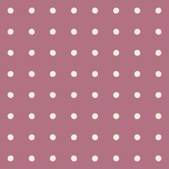 Seamless polka dot pattern on a muted pink background for design and decor © Syaima Levantine