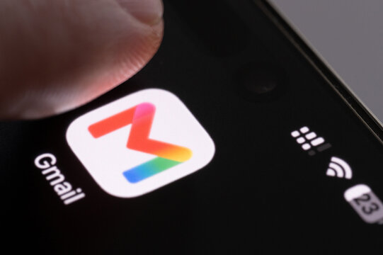 Finger press Gmail app icon