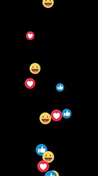 Colorful social media reactions floating upward with hearts, likes, and smiling emojis on black background