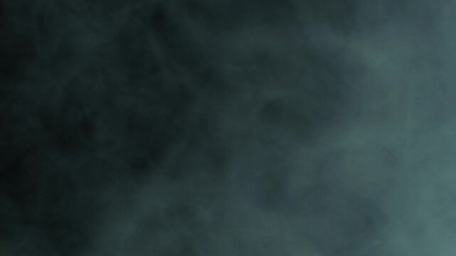 Smoke swirls in the light on the ground. Can be used as a special effect for your projects, video texture or background for designs, scenes, etc. Video in loop.