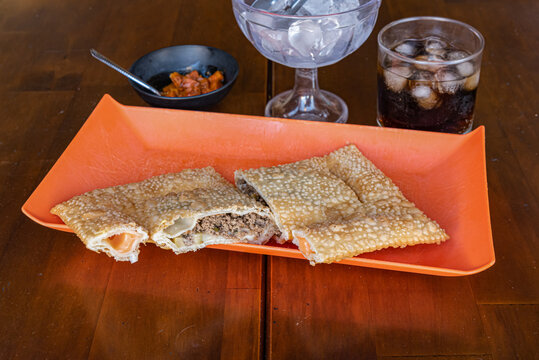 Brazilian pastel pastry with minced meat filling