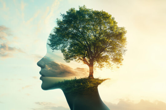 A surreal image of a tree growing from a woman's head. The branches extend into the sky, blending seamlessly, symbolizing unity between human and nature.