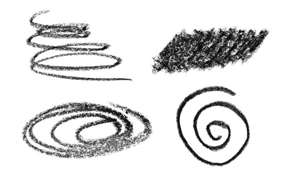 Set of black hand drawn pencil scribble shapes and spiral doodle marks on a paper texture Background