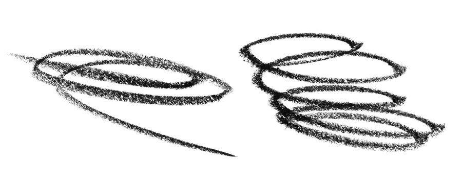 Two hand drawn pencil sketch spirals and circular scribble lines on a simple paper texture Background