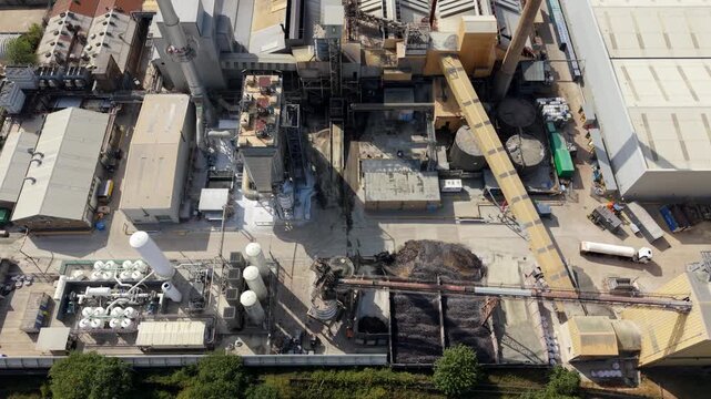 Aerial view of cryogenic liquid nitrogen tanks and ambient air vaporizers at an industrial facility in Harlow, England, United Kingdom.