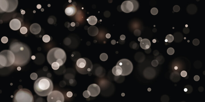 Silver and white bokeh lights with soft blurred glowing circles on a dark background, ideal for elegant holiday designs, winter banners, wedding invitations, luxury advertising and festive presentatio