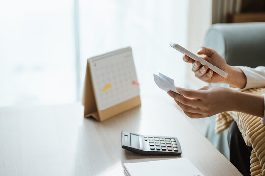 A person holds a receipt for scanning as receipt scan captures expense and document records, connecting bookkeeping with finance and payment verification plus OCR and reimbursement paperwork.