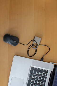 Vertical top view of mouse cable secured with padlock