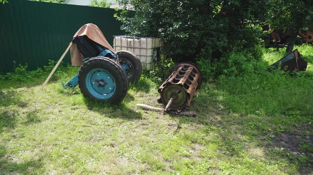 old red combine harvester repair threshing machine replacement of whips on the drum welding work to improve the efficiency of the unit