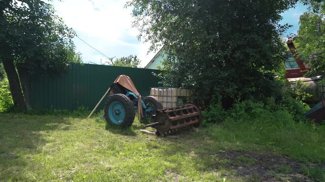old red combine harvester repair threshing machine replacement of whips on the drum welding work to improve the efficiency of the unit