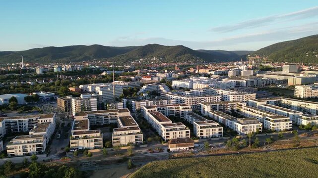 Aerial Pan over Heidelberg Bahnstadt towards S&uuml;dstadt, Bergheim and Neuenheimer Feld, Germany