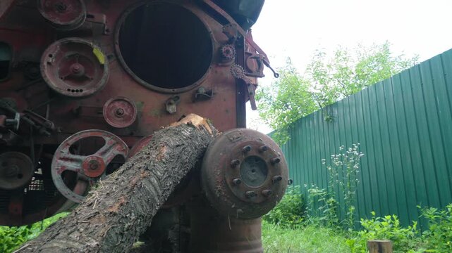 old red combine harvester repair threshing machine replacement of whips on the drum welding work to improve the efficiency of the unit