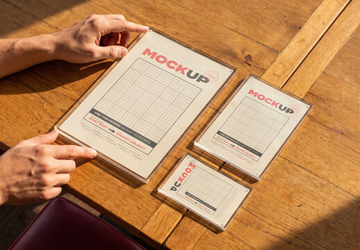 Hands Interacting with Acrylic Protected Pages