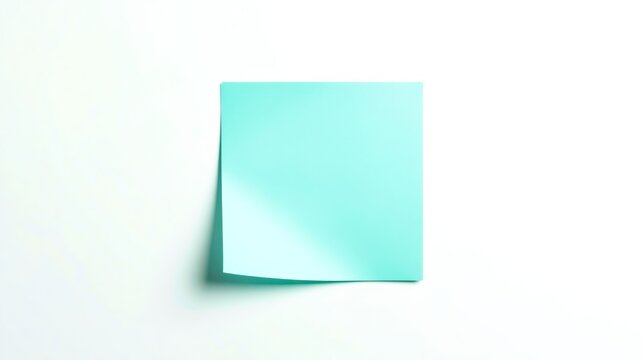 Single mint green sticky note rests on white surface