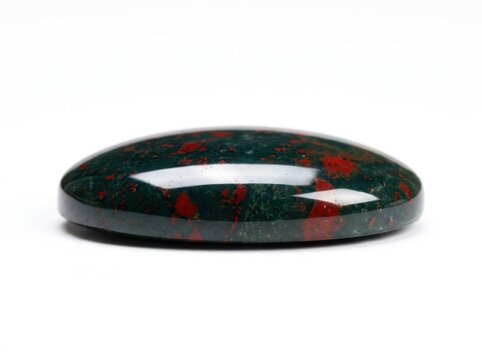 Bloodstone gemstone cabochon isolated on white background