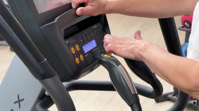 Step-by-step process of setting up a gym machine with adjustments. The user interacts with the control panel and dials for settings.