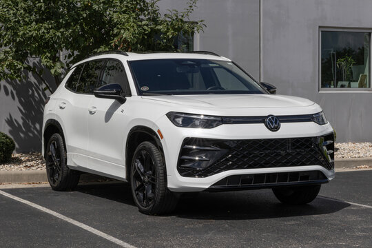 Volkswagen Tiguan 2.0T SE R-Line Black SUV display. VW offers the Tiguan with a 2.0L TSI Turbo 4-Cylinder engine. MY:2026