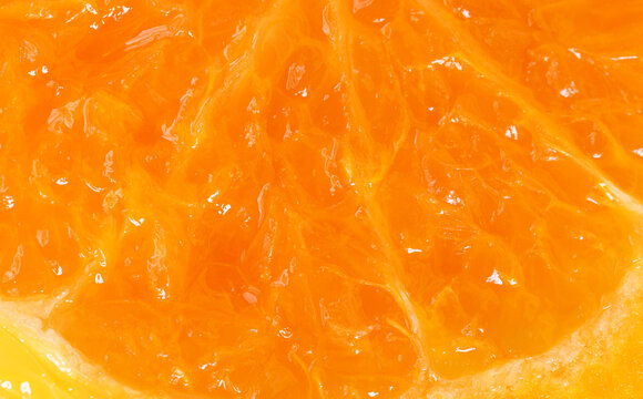 Macro Close-Up of Fresh Orange Pulp Texture,Detailed macro shot showing the juicy texture, vesicles, and vibrant orange color of a fresh ripe orange segment slice, perfect for healthy food.
