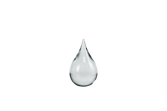 A single clear glass water drop shaped ornament or decorative figurine isolated on a transparent background