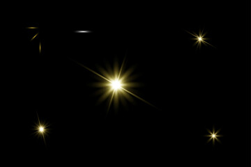Fototapeta premium Golden sparkle starburst light collection with glowing burst elements on black background