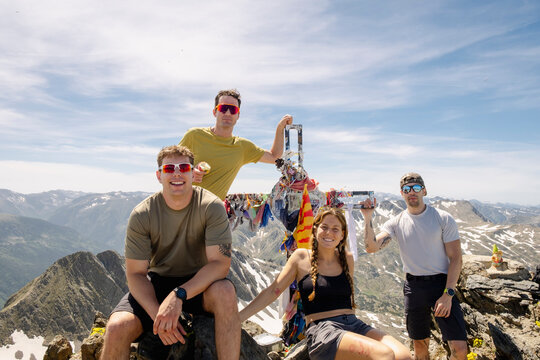 UGC Friends celebrating at Pic Carlit summit in the Pyrenees