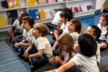 Fototapeta premium Engaged children in classroom learning