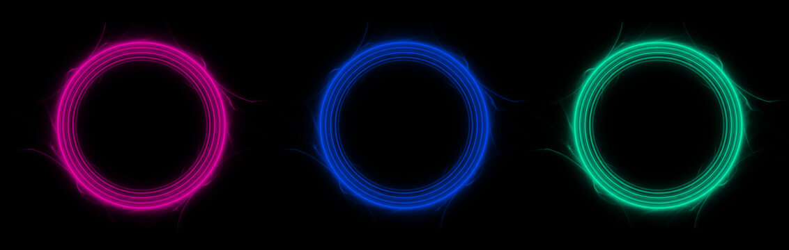 Set of three glowing neon rings in pink, blue, and green colors with light trails isolated on black background