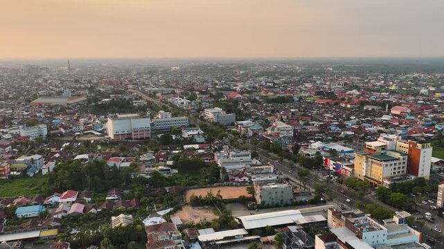 Banjarmasin cityscape under a sunset sky, South Kalimantan, Indonesia