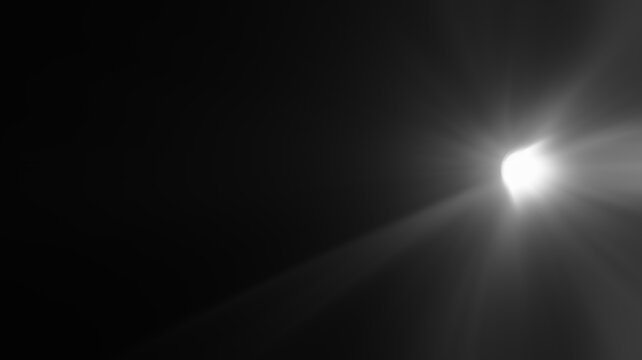 abstract photo of light burst among trees and glitter bokeh. image is blurred. yellow golden bokeh pattern background. Real optical lens flare on black backdrop. sunrays, sun rays beam, burst, sunbeam