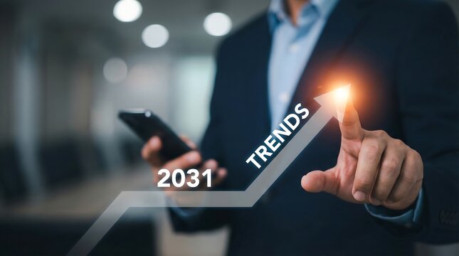 Businessman pointing at 2031 trends upward arrow hologram graphic concept in modern office