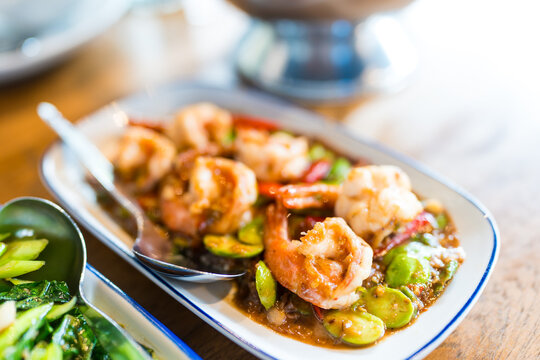 Stir Fried Shrimp with stink bean or bitter bean and Shrimp Paste Southern Thai Style Food (Thai name is Sataw Kapi Kung)