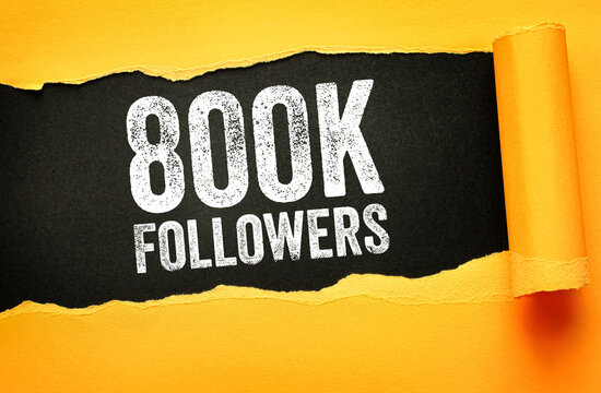 800K Followers text on a torn paper design with bold distressed typography. Concept image for social media milestone, digital community growth, marketing success, or online audience celebration
