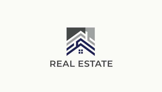 Real estate development business logo design featuring modern geometric roof outlines and a blue window symbol.