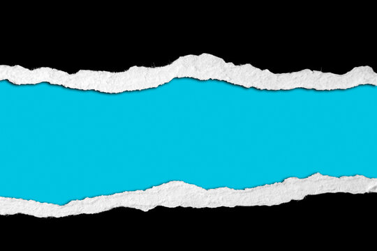 Gap in ripped black paper on blue