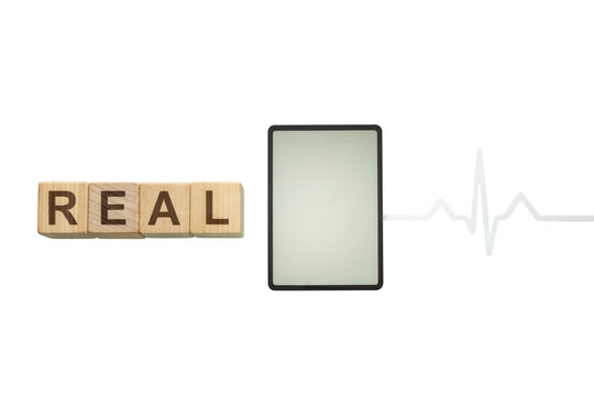 Real Estate with Wooden Scrabble Tiles and Pulse Monitor, Property Search Technology Concept with Glass Surface and Heartbeat Line Isolated on Clean White Background