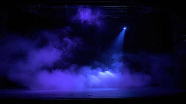 Stage scene with white smoke and ultraviolet spotlight in a dark theater