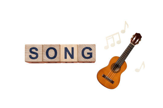 Song word on wooden blocks with ukulele, musical notes on white background, acoustic music composition and songwriting concept