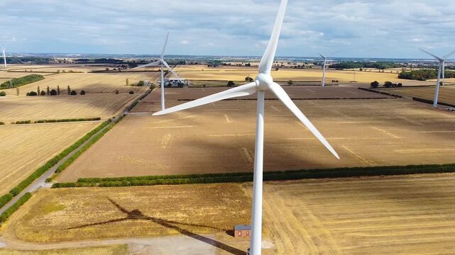 Aerial view of Burton Wold wind farm turbines in Burton Latimer, England, United Kingdom.
