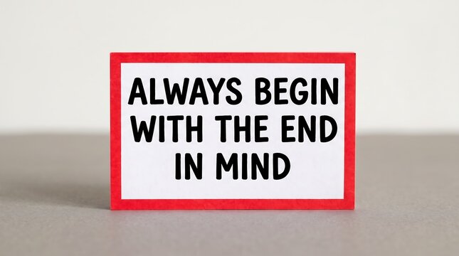 Motivational quote card with text Always Begin With The End In Mind. Inspirational business message on red framed card. Goal setting concept.