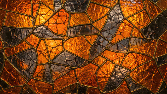 Abstract Orange Amber Stained Glass Mosaic with Irregular Cracked Geometric Pattern