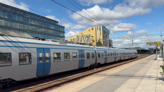 UPPSALA, SWEDEN &ndash; AUGUST 20, 2026: An SL commuter train model Alstom Coradia Nordic X60B arriving at the platform of Uppsala Central