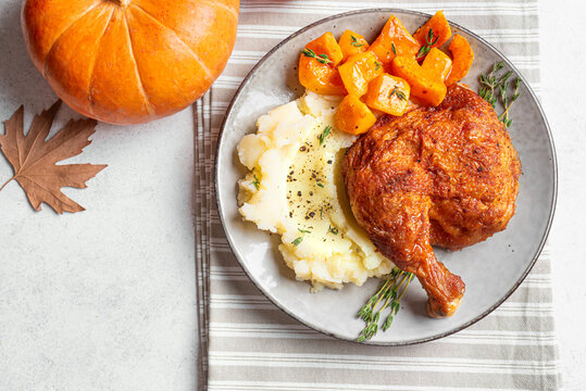 Autumn meal: roasted chicken with pumpkin and mashed potato