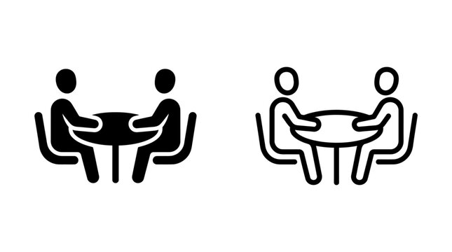 Two people sitting at round table meeting business discussion icon vector